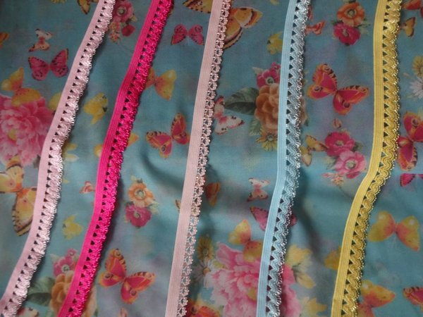 Stoff weicher elastischer Tüll Mesh  Meterware türkis mit Schmetterlinge und Blumen 1,60m breit
